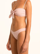 Back view of Ocean Mystery red gingham hipster bikini bottom with cheeky coverage.
