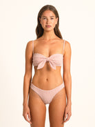 Ocean Mystery red gingham sweetheart bikini top with knotted front detail and adjustable straps, front view.