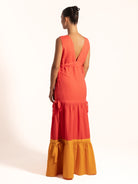 Ocean Mystery red and mustard yellow maxi dress with plunging V neckline and elegant summer silhouette.