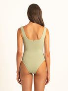 Back view of Ocean Mystery sage one piece swimsuit with scoop back design.