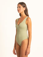 cean Mystery sage one piece swimsuit with deep V neckline, front view.