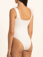 Back view of Ocean Mystery white one piece swimsuit with scoop back design.