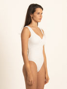 Ocean Mystery white one piece swimsuit with high leg cut for a flattering silhouette.