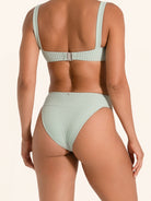 Pastel green textured swim bottom with flattering fit.