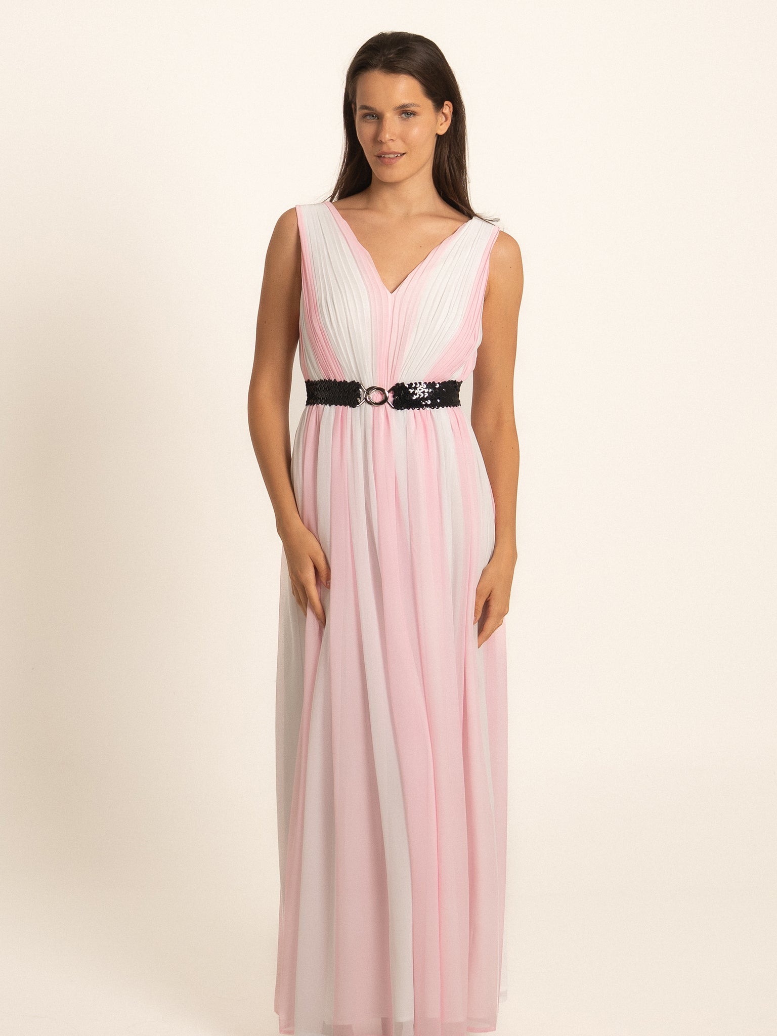 Front view of pink V neck maxi dress with black waist belt