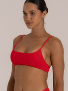 Side view of red bralette bikini top with minimalist straps