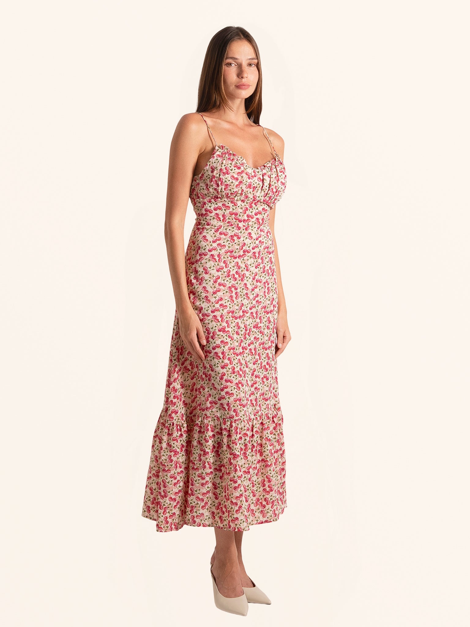 Full length front view of red floral midi dress with ruffled skirt