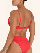 Minimal red bikini top with sleek square neckline.