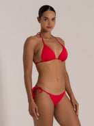 Side angle of red string bikini top with ruched detail from Ocean Mystery