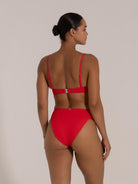 Cheeky cut red bikini bottom with ribbed stretch fabric