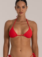 Red textured bikini top with triangle cups and minimal coverage, front view