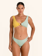 Resort wear bikini top in mustard yellow and mint green block color.