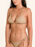 Resort wear beige bikini top in timeless triangle design.