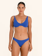 Royal blue bikini top with structured scoop neckline and adjustable straps.
