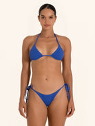 Royal blue bikini top featuring classic triangle cut with ties.