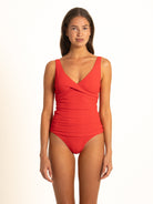Straight-on front view of the Ruby ribbed tankini, perfectly displaying the elegant crossover wrap front bust and flattering ruched midsection.