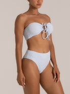 Zoomed-in front of ruched lilac bikini bottom with knotted side ties