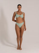 Light green high-waisted bikini set with scoop bottom and wide straps