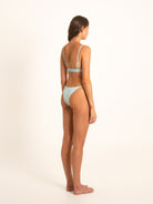 Rear angle of light blue bikini showing soft band and cheeky back coverage