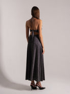 Back view of shimmer halter backless maxi dress