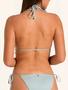 Back view of light blue shimmer bikini set with halter tie top and cheeky tie side bottom.