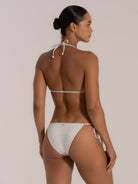 Back view of silver halter bikini top with neck and back tie straps