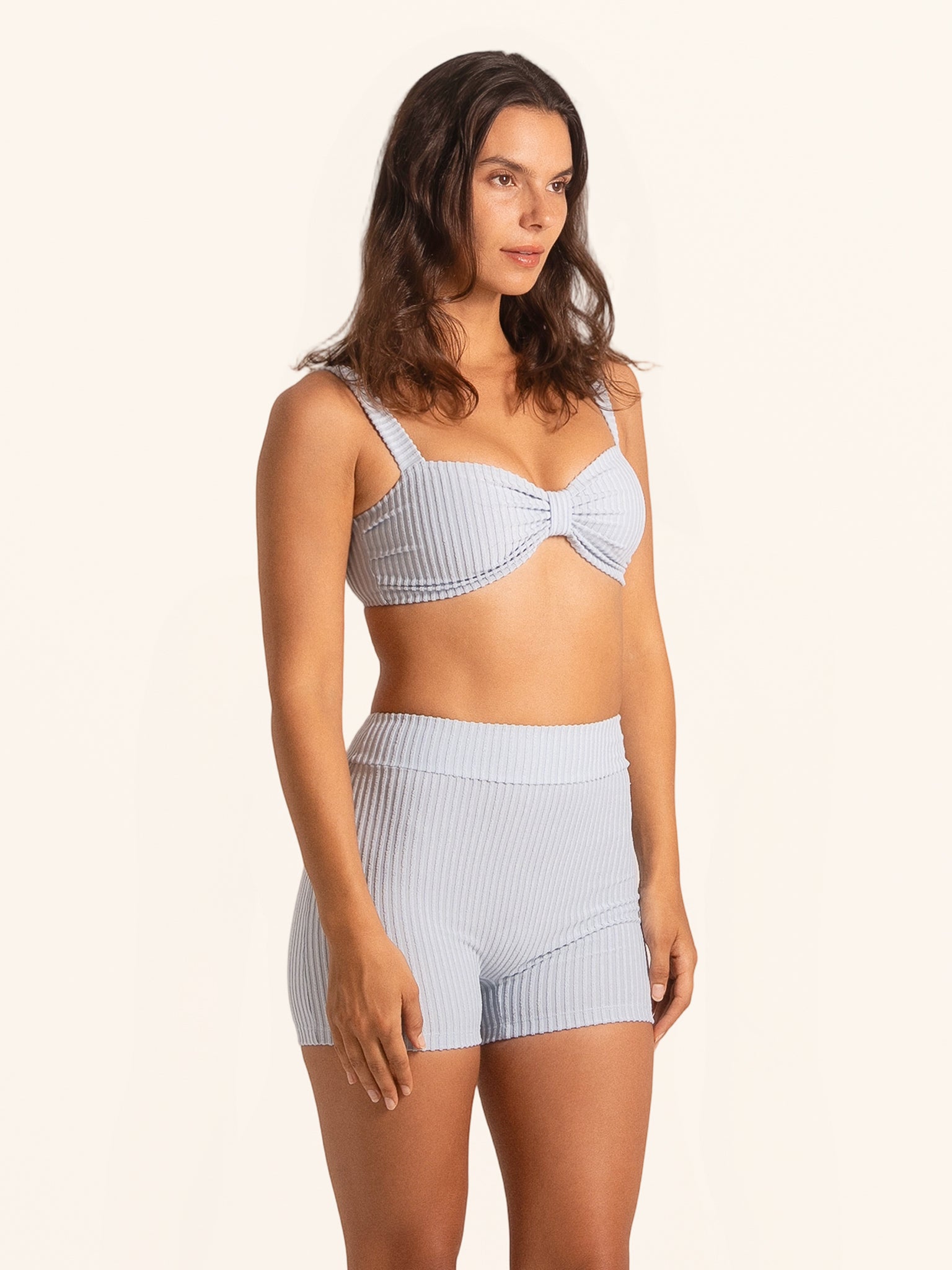 Striped swim shorts in blue with high-rise waistline.