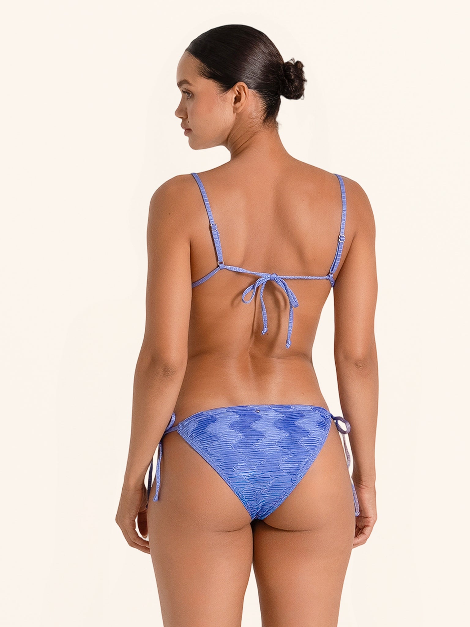Stylish blue swimwear bottom with side tie detailing.
