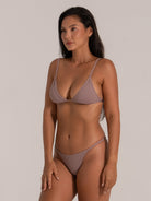 Side angle of taupe triangle bikini top with soft textured fabric