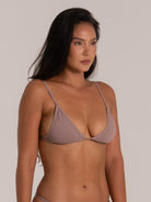 Close side detail of taupe triangle bikini top showing fabric texture and fit