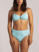 Model in a high-waisted light blue textured bikini set with a keyhole design – front facing