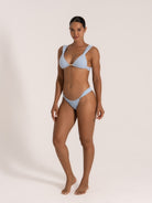 Baby blue textured bikini set with triangle top and low rise side tie bottom
