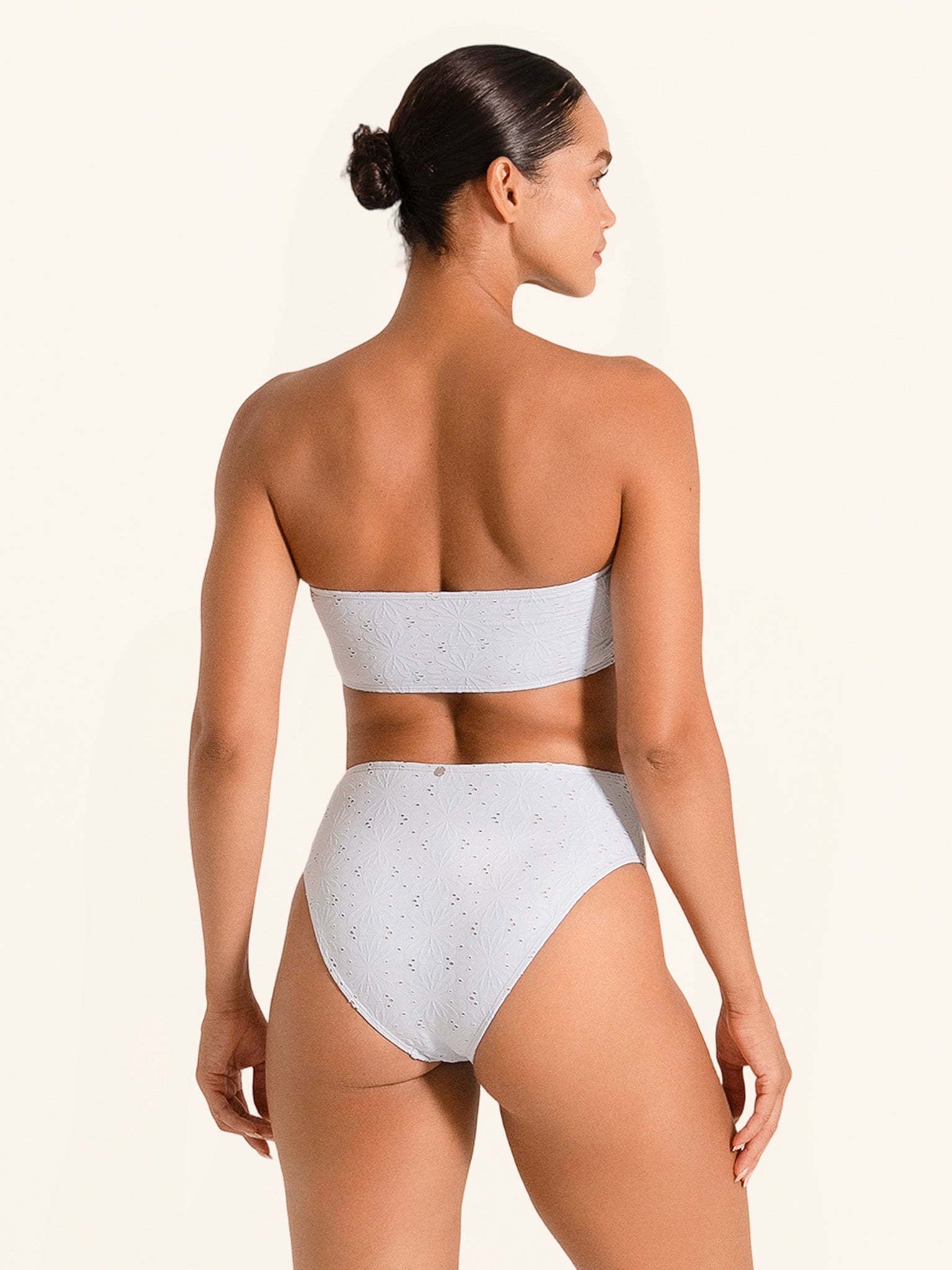 Trendy light blue bandeau swimwear top with stylish cutout tie.