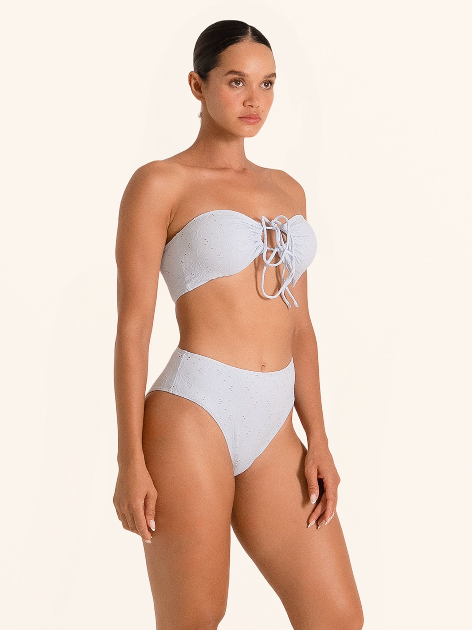 Trendy light blue bikini bottom featuring high waist cut.
