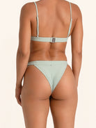 Trendy mint green high waist bikini bottom with textured fabric.