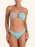 Two tone blue and grey bikini bottom with ring detail on the side.