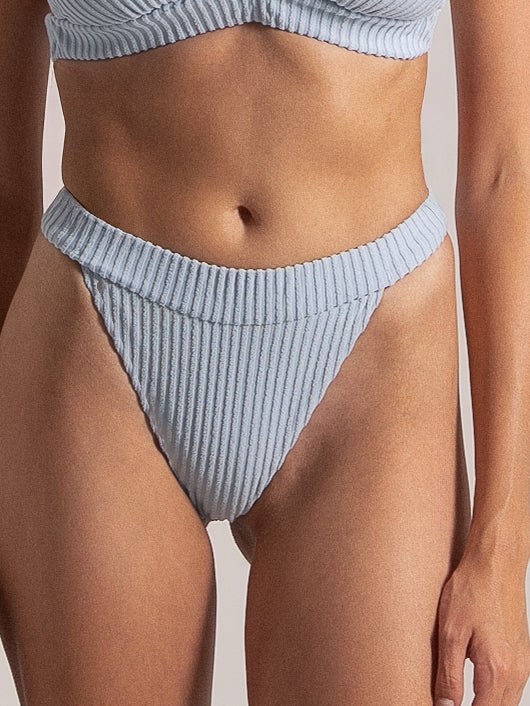 Close-up of ribbed high-rise bikini bottom with wide waistband in light blue