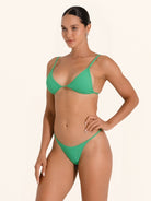 Vibrant green bikini top perfect for a bold summer beach look.