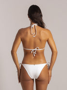 Back view of white halter bikini top with adjustable tie straps