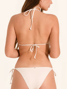 White halter neck bikini top perfect for summer beach days.
