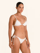 White string bikini top in triangle style with removable padding.