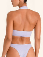 Women’s lilac swim top featuring chic cutout design.