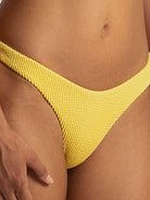 Close-up of front detail on yellow crinkle bikini bottom with V-shaped cut